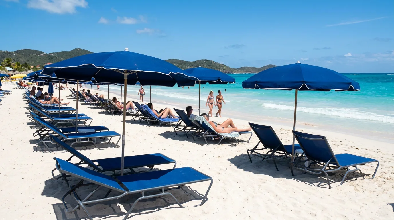 Blue loungers and umbrellas on Orient Bay beach, St Martin